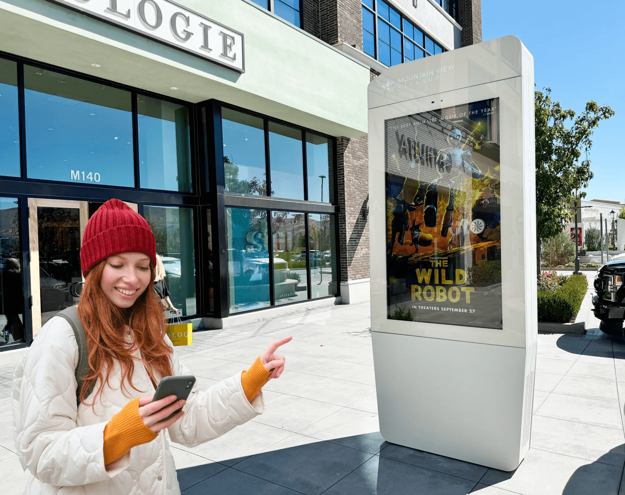 An outdoor advertising installation at street level