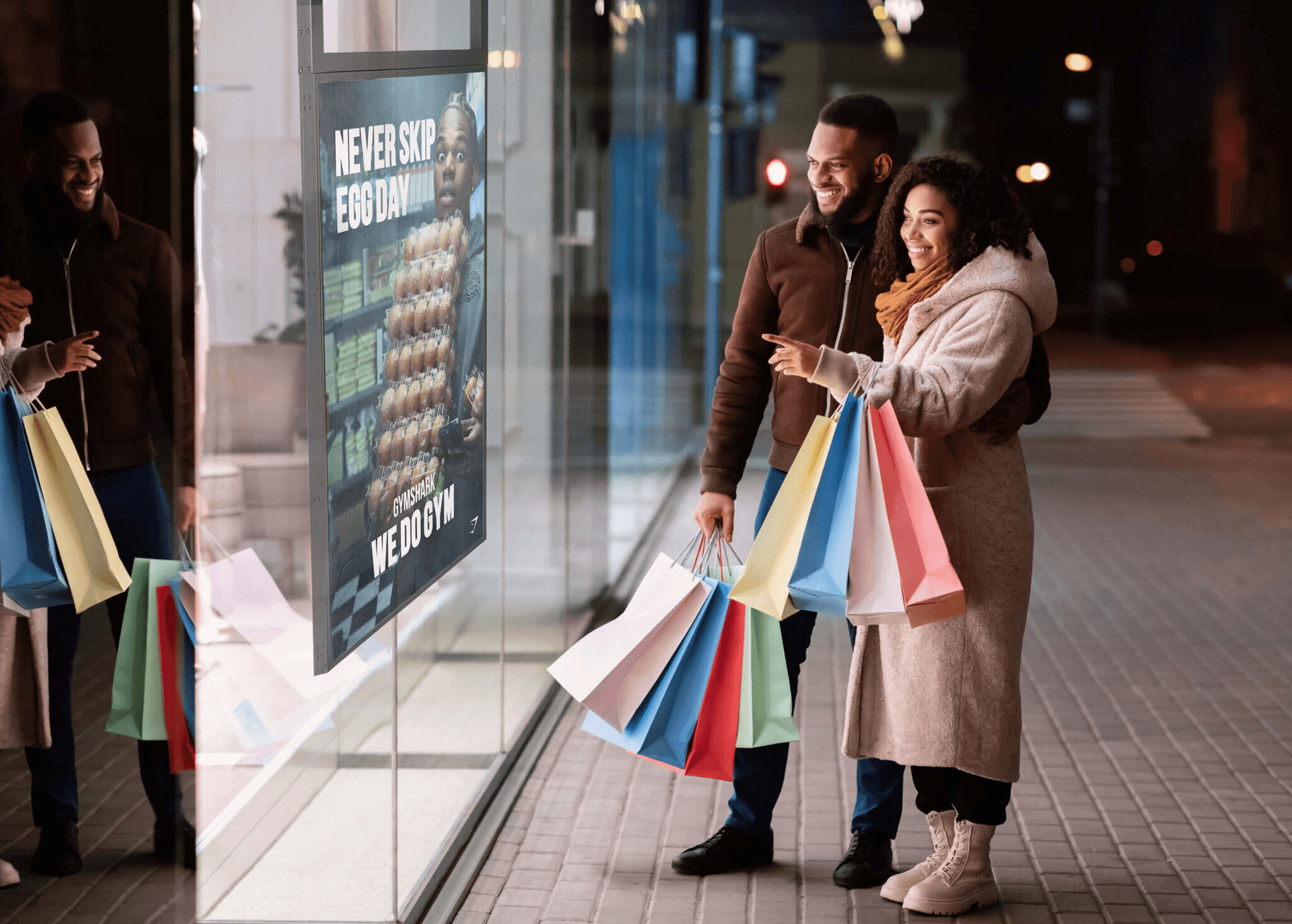 An urban plaza with digital advertising